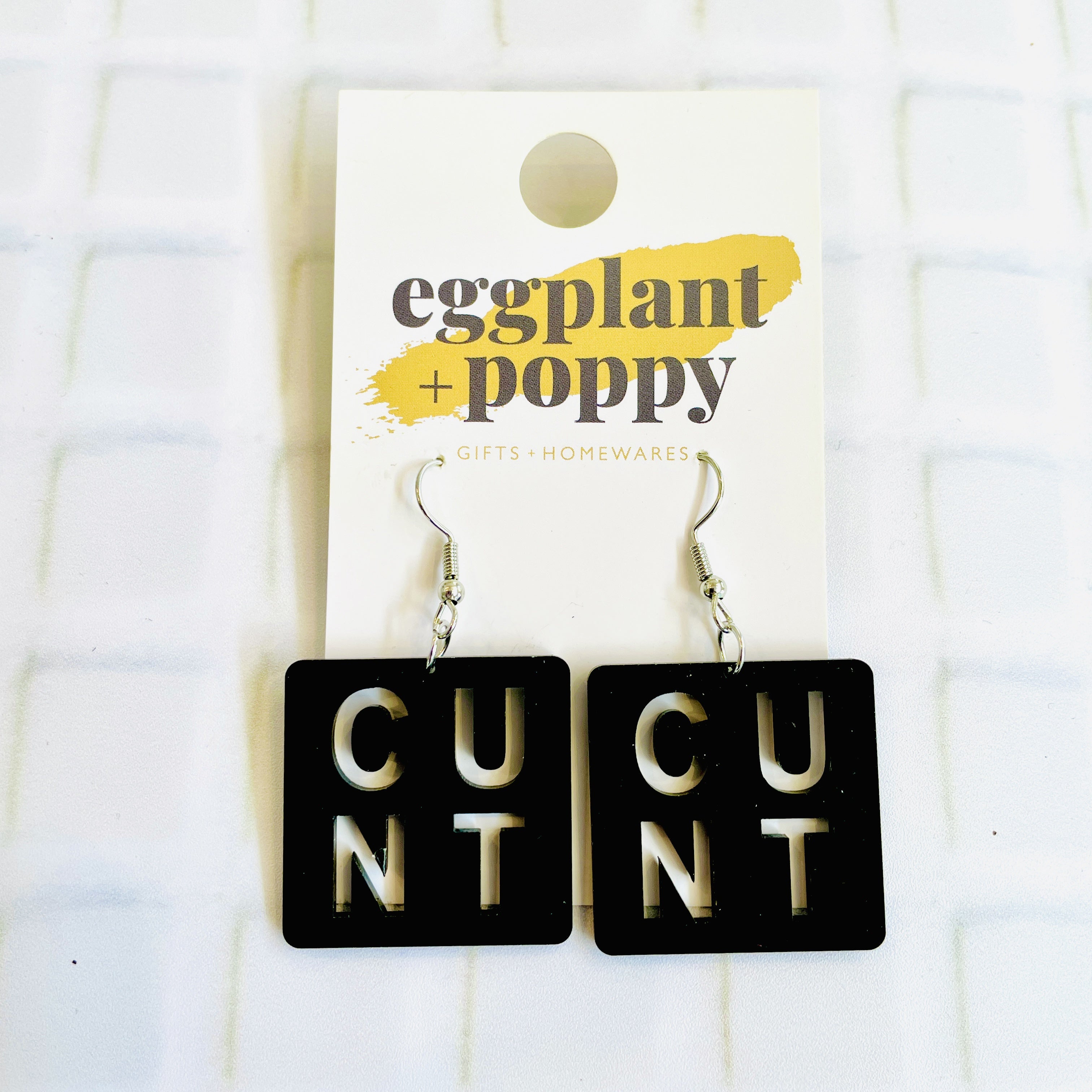 Cut Out Earrings - Cunt