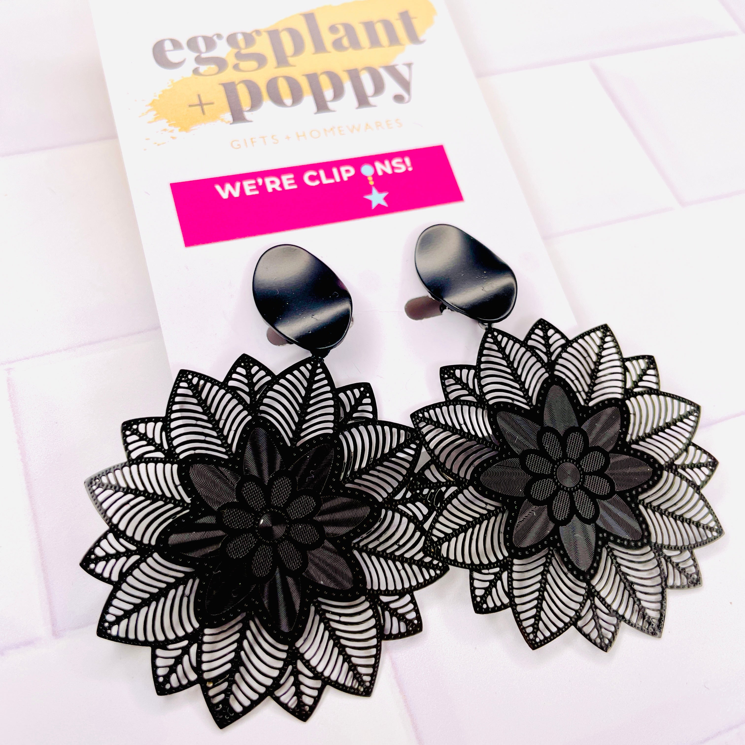Clip On Earrings - Black Metal Flower