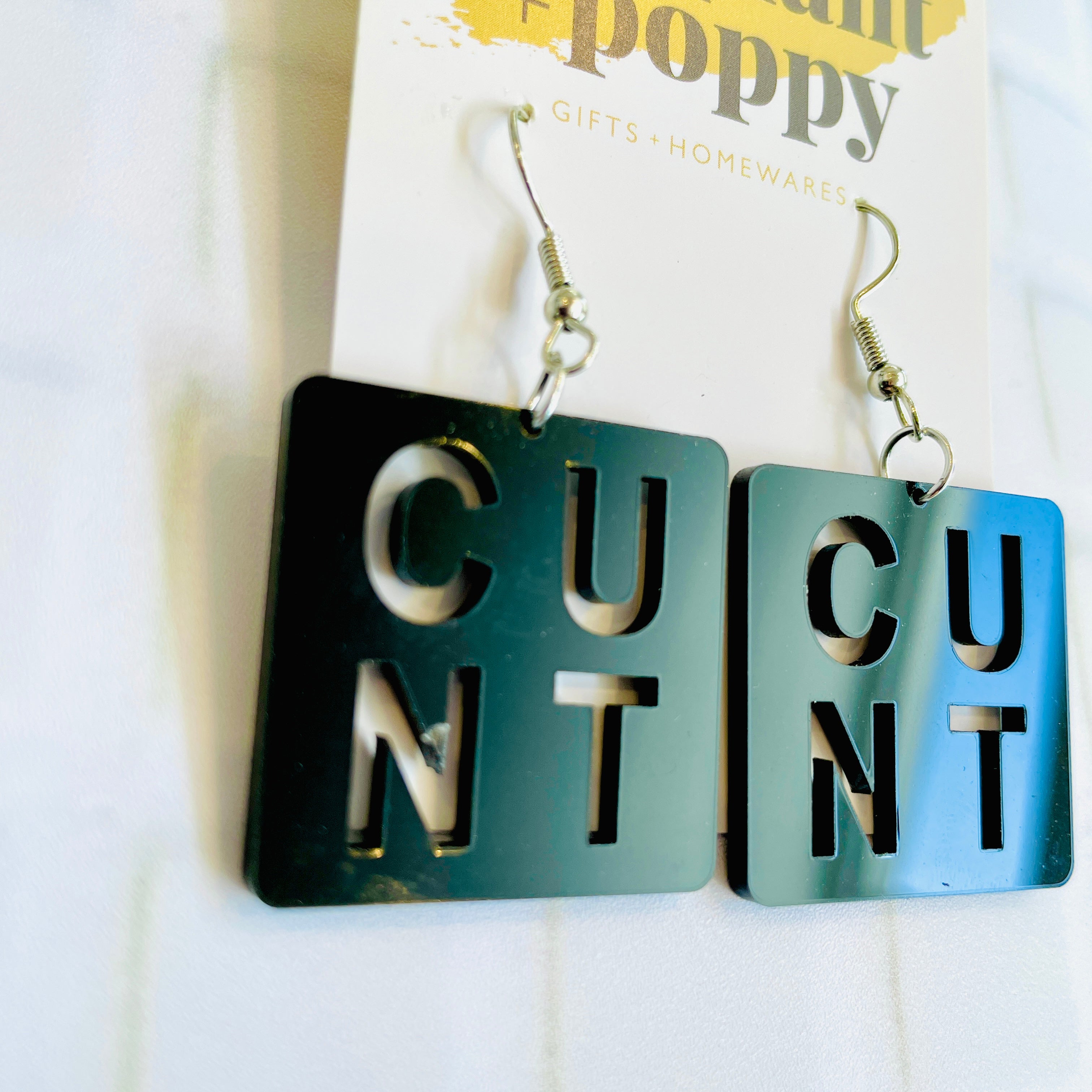 Cut Out Earrings - Cunt