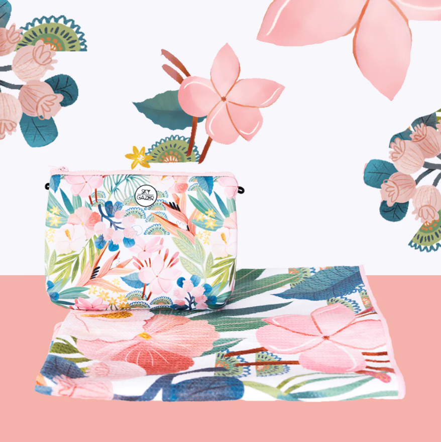 Skygazer Towel - The Avalon. A pink and blue tropical flower design on towel with matching case. Available in-store and online at Eggplant+Poppy, Cairns.