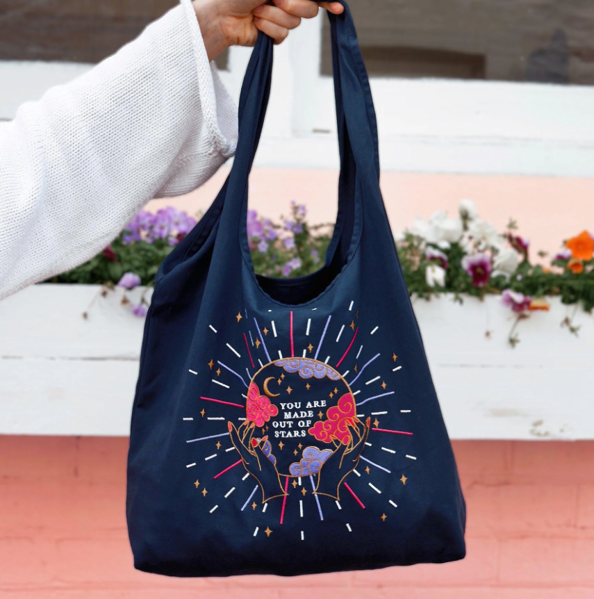 You are Made of Stars Tote Bag
